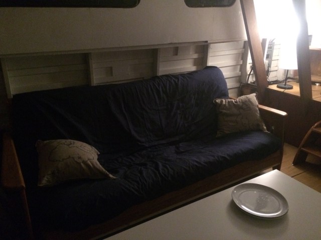 Our new-to-us futon - multi-use items are essential on a boat